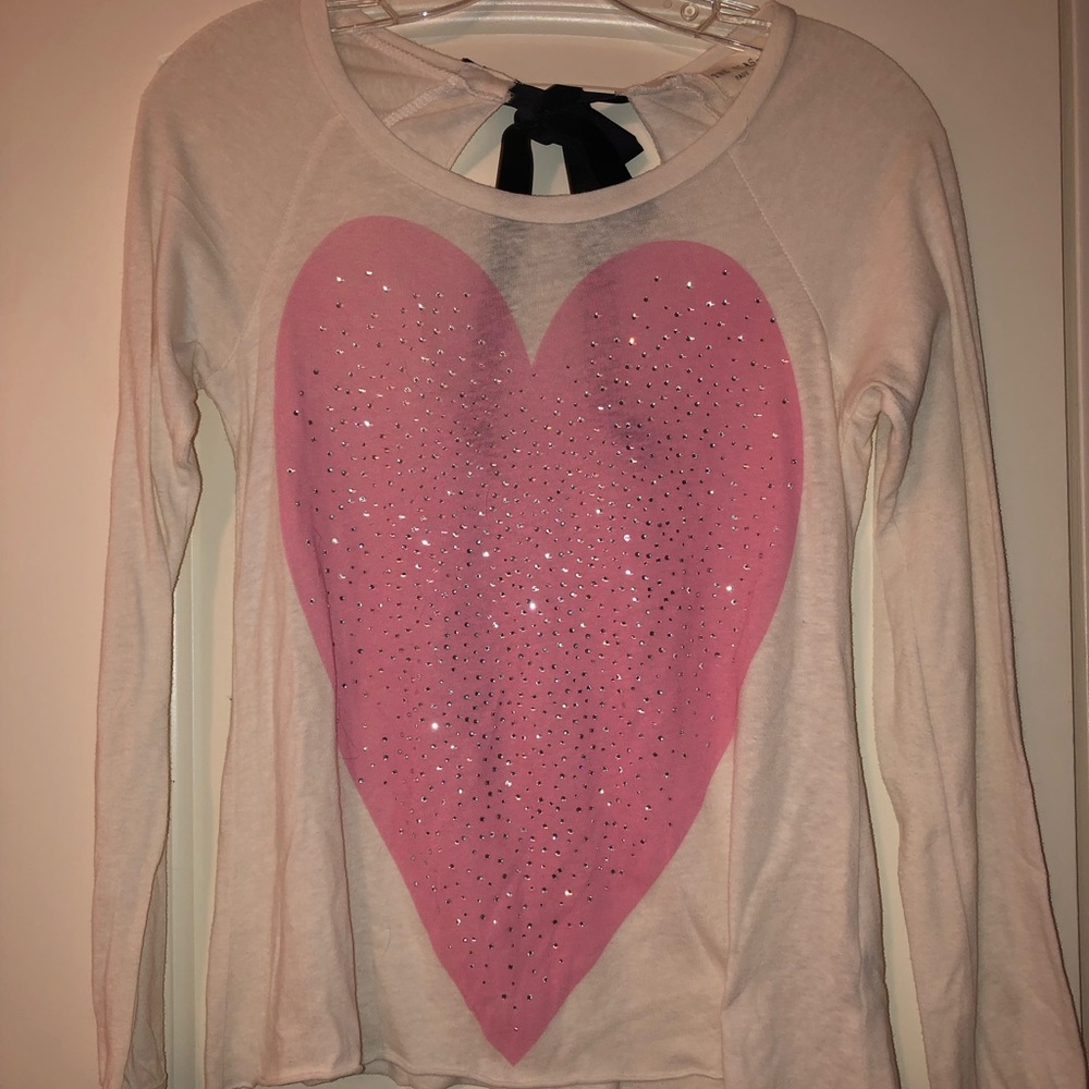 White flowy top with pink bedazzled heart!